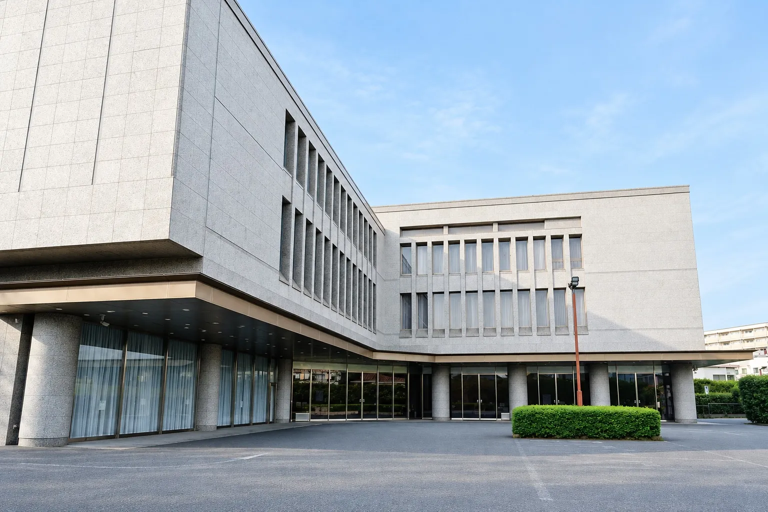 落合斎場の外観。石張りの3階建ての建物(イメージ)